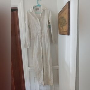 A all white zip up jumpsuit